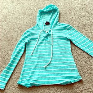 A sweater with a hood